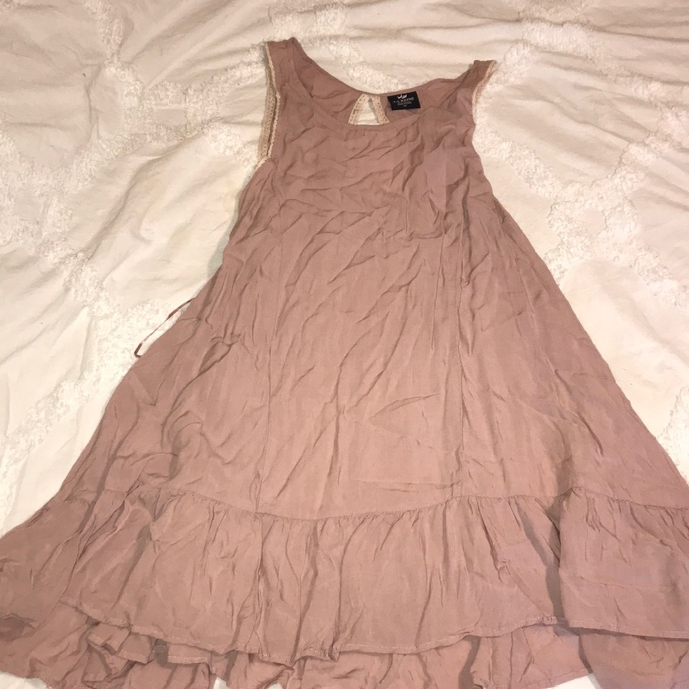 Light pink, flowy tank top dress.